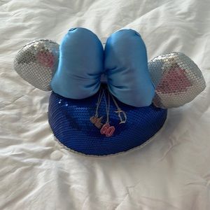 Disneyland 60th anniversary Minnie hat with sequins and charms.